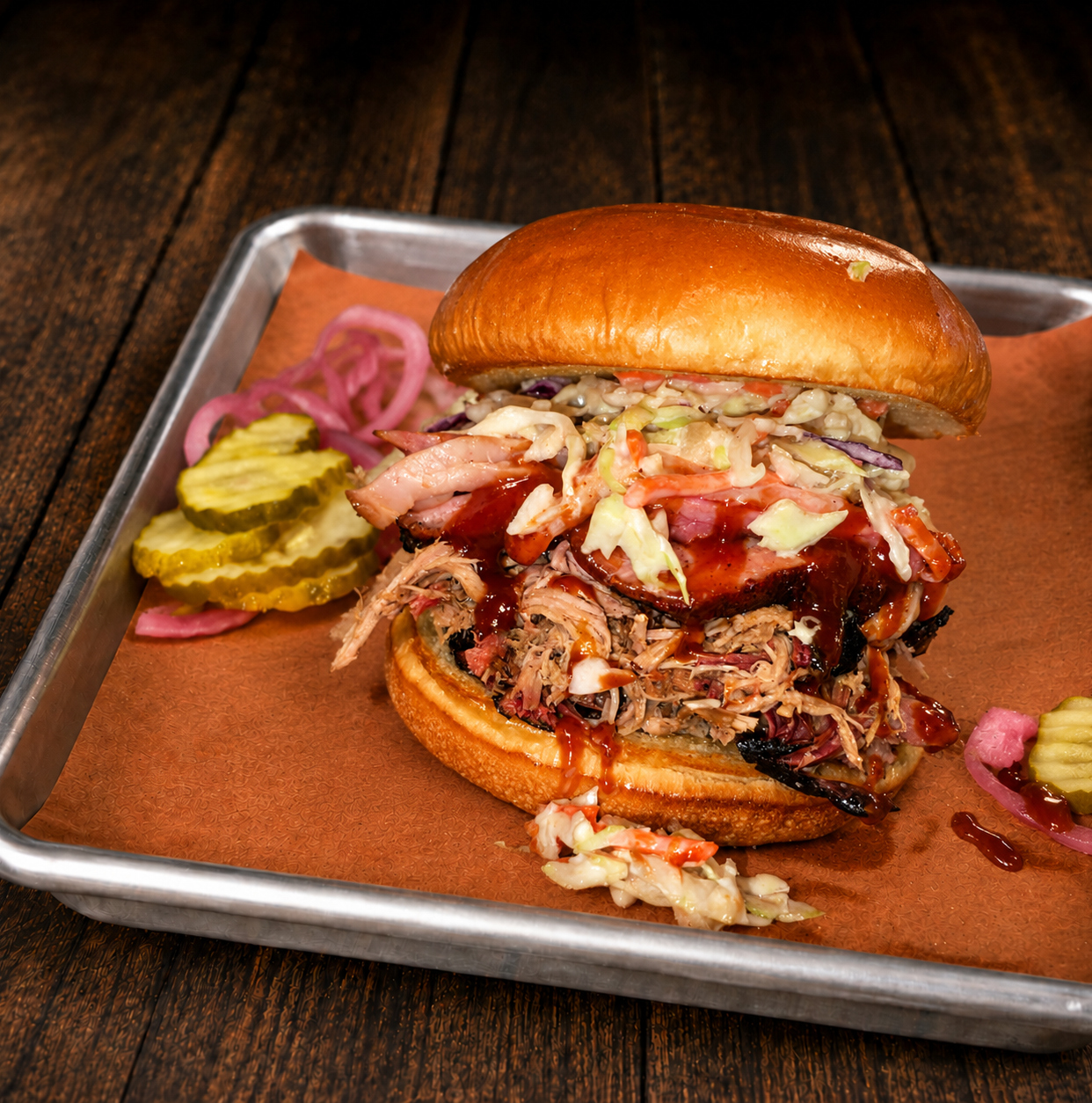 Pit Master's Classic sandwich with pulled pork, brisket and slaw